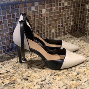 Nude/ Black colored heels